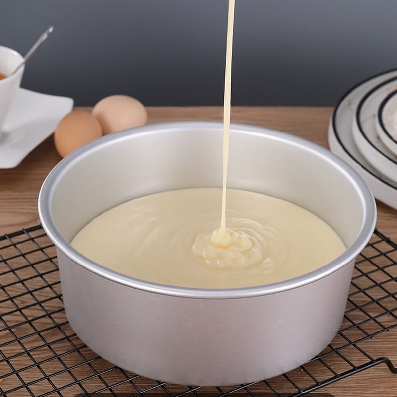 verser pate gateau dans moule a gateau