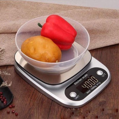 nana pese legumes avec balance cuisine numerique