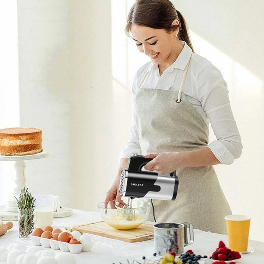 maman prepare gateau avec batteur electrique