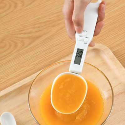 maman mesure deurre fondu avec cuillere doseuse