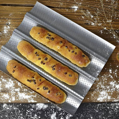 nana fait cuire brioche dans moule a pain perfore