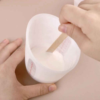 nana melange pate dans verre mesureur gradue