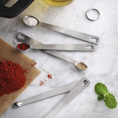 nana mets cuillere doseuse ajustable sur table