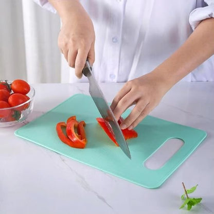 nana tranche legumes sur planche a decouper