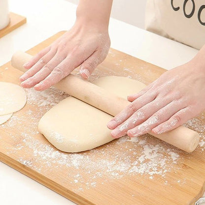 nana etale pate pizza avec rouleaux a patisserie