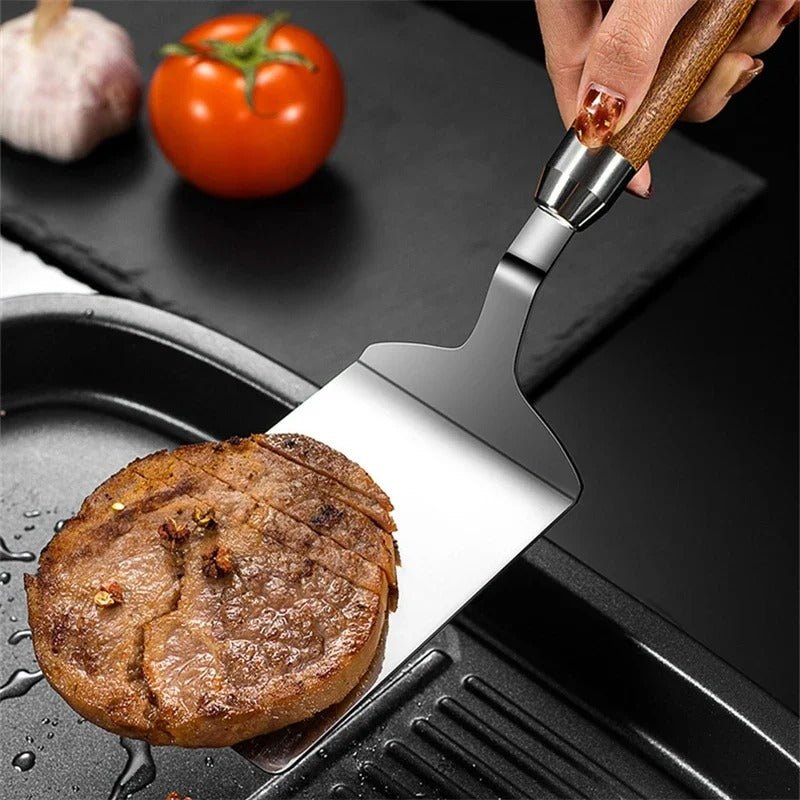 prendre galette viande avec spatule cuisine