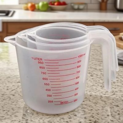 maman empile verre doseur pour ranger